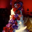 Wedding reception cake with fresh roses,orchids